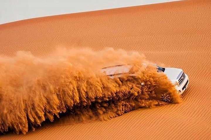 Experience the thrill of dune bashing across endless sands where adventure meets the serenity of the desert followed by a cozy BBQ dinner under the starry sky.